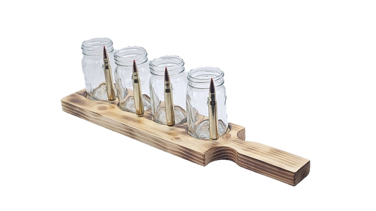 4 shot glasses or flight glasses with 30-06 Winchester bullet handle in a nice serving board with a carry handle